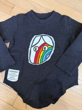 nununu Black Long Sleeve Tee with Colorful Rainbow Face Patch